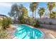 Inviting kidney-shaped pool surrounded by lush landscaping at 6223 Foothill Blvd, Las Vegas, NV 89118