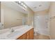 Clean bathroom, tub/shower combo, wood vanity at 6255 W Arby Ave # 258, Las Vegas, NV 89118