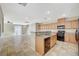 Spacious kitchen with granite counters and oak cabinets at 6255 W Arby Ave # 258, Las Vegas, NV 89118