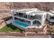 Stunning modern home boasts a private pool and outdoor living spaces at 631 Cityview Ridge Dr, Henderson, NV 89012