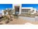 Contemporary home with desert landscaping, rock ground covering and unique architectural features at 631 Cityview Ridge Dr, Henderson, NV 89012