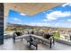 This outdoor patio features comfortable seating and gorgeous views at 631 Cityview Ridge Dr, Henderson, NV 89012