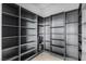 Spacious walk-in pantry with custom gray shelving, providing ample storage space at 631 Cityview Ridge Dr, Henderson, NV 89012