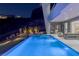 Inviting pool area with a built-in grill perfect for evening entertaining at 631 Cityview Ridge Dr, Henderson, NV 89012