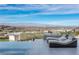 Outdoor pool deck with mountain and city views, lounge seating, and an infinity pool at 631 Cityview Ridge Dr, Henderson, NV 89012