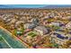 Aerial view of a residential neighborhood with a large house and pool at 6971 Cedar Basin Ave, Las Vegas, NV 89142