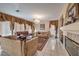 Elegant living room featuring a fireplace, chandelier, and ample seating at 6971 Cedar Basin Ave, Las Vegas, NV 89142