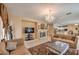 Bright living room showcasing a fireplace and open concept design at 6971 Cedar Basin Ave, Las Vegas, NV 89142