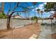 Spacious backyard with a concrete block wall at 705 Thousand Oaks Dr, Las Vegas, NV 89123