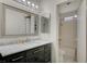 Bathroom with a marble countertop vanity and a shower-tub combo at 705 Thousand Oaks Dr, Las Vegas, NV 89123