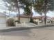 Exterior view of single story home with attached garage at 705 Thousand Oaks Dr, Las Vegas, NV 89123