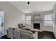 Inviting living room featuring a fireplace and dark wood-look floors at 705 Thousand Oaks Dr, Las Vegas, NV 89123