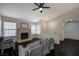 Bright living room with a fireplace and dark wood-look floors at 705 Thousand Oaks Dr, Las Vegas, NV 89123