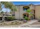 Front view of two-story building with landscaping at 7885 W Flamingo Rd # 1037, Las Vegas, NV 89147