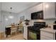 Modern kitchen with stainless steel appliances and white shaker cabinets at 7885 W Flamingo Rd # 1037, Las Vegas, NV 89147