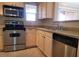 Modern kitchen with stainless steel appliances and light wood cabinets at 8101 W Flamingo Rd # 2040, Las Vegas, NV 89147