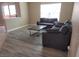 Living room with grey sofa, coffee table and rug at 8101 W Flamingo Rd # 2040, Las Vegas, NV 89147