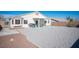 Large backyard with gravel, patio, and pergola at 8145 Dancing Ave, Las Vegas, NV 89131