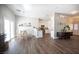 Bright dining area with hardwood floors and a view of the kitchen at 8145 Dancing Ave, Las Vegas, NV 89131