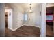 Light and airy entryway with wood-look floors and neutral walls at 8145 Dancing Ave, Las Vegas, NV 89131