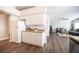 Kitchen with white cabinets, stainless steel appliances, and a view of living room at 8145 Dancing Ave, Las Vegas, NV 89131