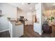 Modern kitchen with white cabinets, stainless steel appliances, and hardwood floors at 8145 Dancing Ave, Las Vegas, NV 89131