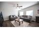 Cozy living room featuring gray sofas and a wood coffee table at 8145 Dancing Ave, Las Vegas, NV 89131