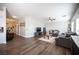 Spacious living room with gray sofas and wood-look floors at 8145 Dancing Ave, Las Vegas, NV 89131