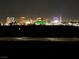 Distant night view of Las Vegas city lights from afar at 8255 Las Vegas Blvd # 611, Las Vegas, NV 89123