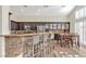 Spacious kitchen featuring granite countertops, stainless steel appliances, and an island with seating at 8501 Vivid Violet Ave, Las Vegas, NV 89143