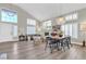 High-ceiling living area with dining area and hardwood floors at 8501 Vivid Violet Ave, Las Vegas, NV 89143