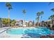 Resort-style pool with a surrounding patio and lounge chairs at 8600 W Charleston Blvd # 1034, Las Vegas, NV 89117