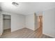 Bright bedroom with a spacious closet and light wood-style laminate flooring at 8889 W Torino Ave, Las Vegas, NV 89148