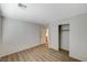 Bedroom features wood-look floors, closet, and neutral paint, offering a calming space at 8889 W Torino Ave, Las Vegas, NV 89148