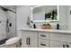 Double vanity bathroom with marble shower and modern design at 909 Hassett Ave, Las Vegas, NV 89104