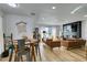 Bright living room featuring hardwood floors and a modern fireplace at 909 Hassett Ave, Las Vegas, NV 89104