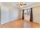 Bedroom with wood floors and ceiling fan at 932 Angel Star Ln, Las Vegas, NV 89145