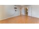 Bright bedroom with wood flooring and mirrored closet at 932 Angel Star Ln, Las Vegas, NV 89145