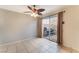 Dining area with tile floors and sliding glass door to patio at 932 Angel Star Ln, Las Vegas, NV 89145