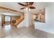 Dining area with tile floors, kitchen access and staircase at 932 Angel Star Ln, Las Vegas, NV 89145