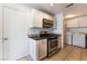 Kitchen boasts stainless steel appliances and light cabinets at 932 Angel Star Ln, Las Vegas, NV 89145