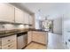 Kitchen features granite countertops and a view to the backyard at 932 Angel Star Ln, Las Vegas, NV 89145