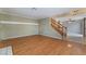 Living room with hardwood floors, fireplace and staircase at 932 Angel Star Ln, Las Vegas, NV 89145