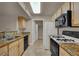 View of kitchen with granite countertops and appliances at 950 Seven Hills Dr # 1512, Henderson, NV 89052