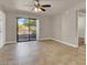 Bright living room with tile floors and sliding glass door to patio at 950 Seven Hills Dr # 1512, Henderson, NV 89052