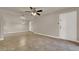 Bright living room with tile floors and ceiling fan at 950 Seven Hills Dr # 1512, Henderson, NV 89052