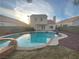 Inviting backyard with pool, spa, and patio, ideal for outdoor living at 9570 Lavarun Ct, Las Vegas, NV 89123