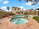 Relaxing backyard with a large pool and a hot tub at 9570 Lavarun Ct, Las Vegas, NV 89123