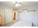 Spacious bedroom with double door closet and ceiling fan at 9843 Frosty Canyon Ct, Las Vegas, NV 89183