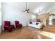 Bright living room with wood floors, vaulted ceiling, and elegant decor with a chandelier at 9843 Frosty Canyon Ct, Las Vegas, NV 89183